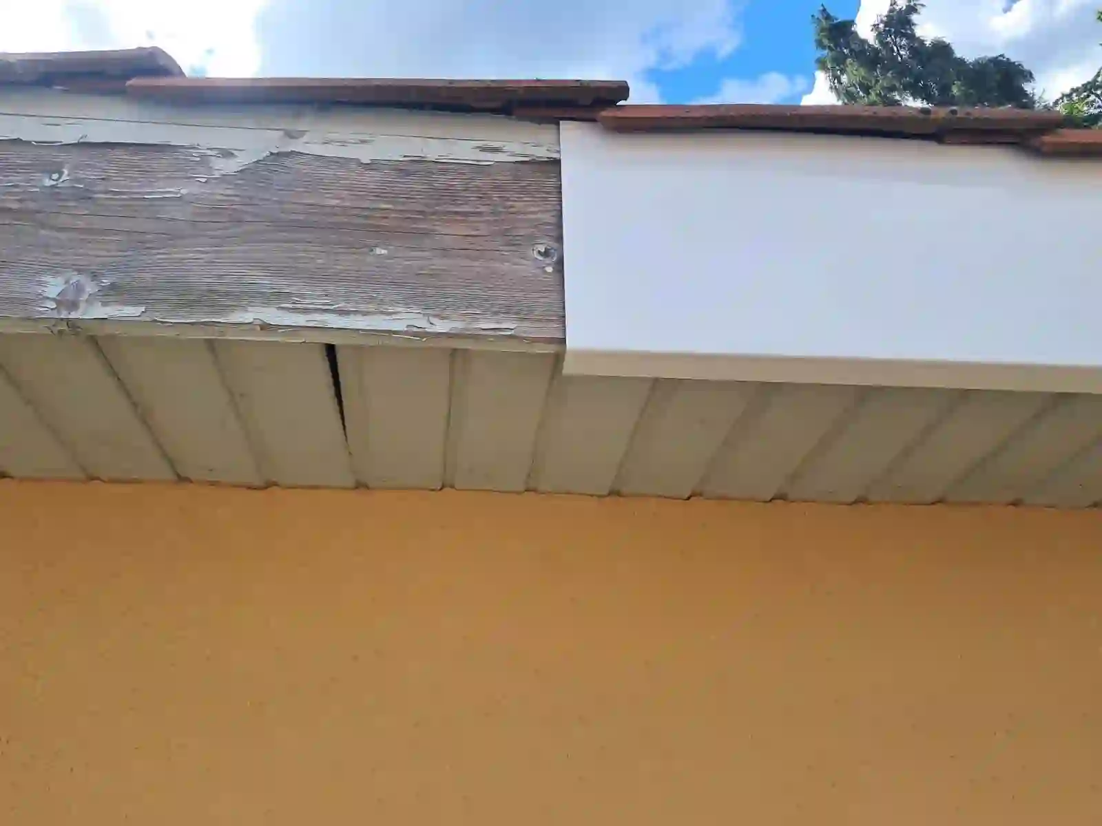 Planche de rive après habillage aluminium neuf